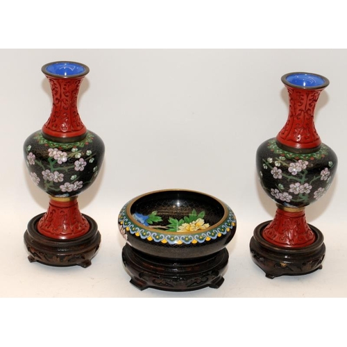 65 - Handed pair of Oriental cloisonné vases with applied cinnabar decoration together a similar bowl all... 