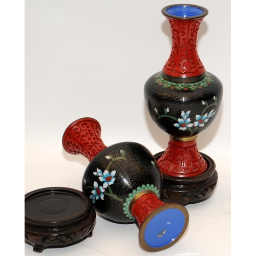 65 - Handed pair of Oriental cloisonné vases with applied cinnabar decoration together a similar bowl all... 