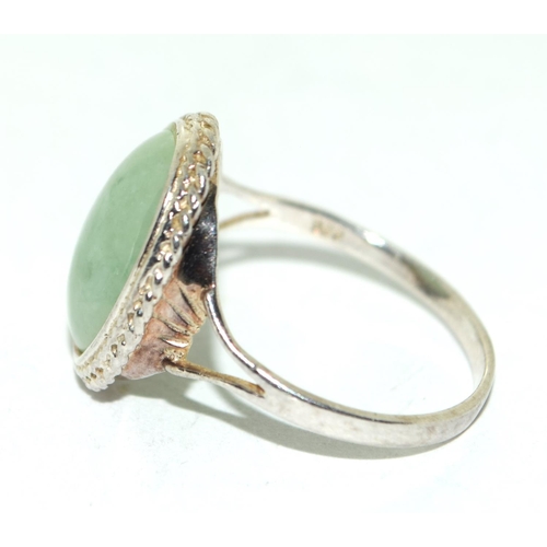 227 - A 925 silver and oval jadeite ring size O