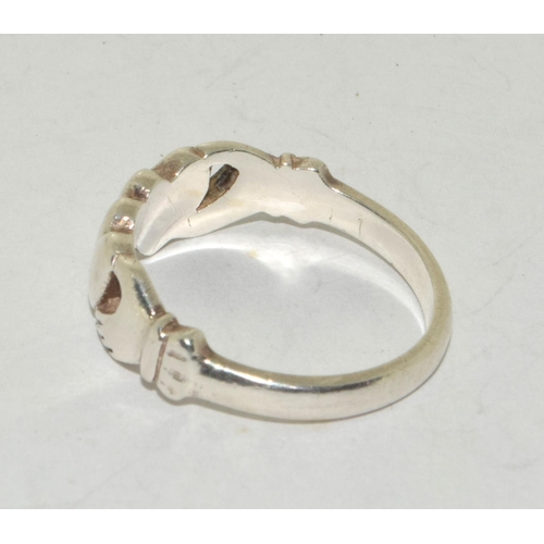 173 - A 925 silver Claddagh ring Size O.