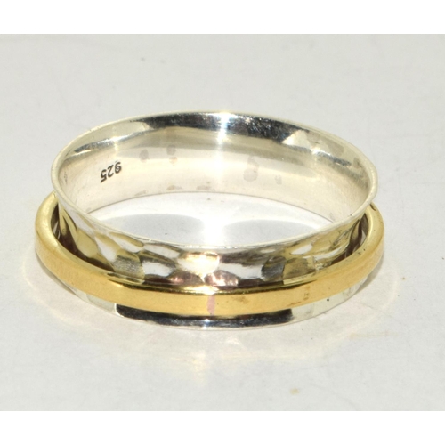 231 - A 925 silver and gold spinner ring, Size S