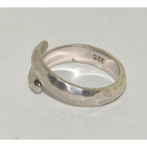 221 - A Fiyah heavy 925 silver adjustable ring.