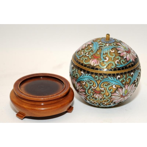 45 - Oriental cloisonne lidded pot of small proportions on wooden stand 9x6cm