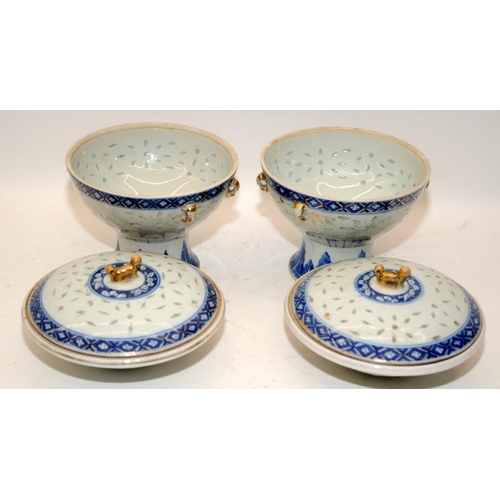 98 - A pair of Chinese 19th century Kangxi style rice grain tureens with inner bowls and finished with gi... 