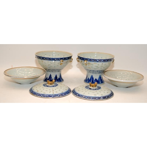 98 - A pair of Chinese 19th century Kangxi style rice grain tureens with inner bowls and finished with gi... 