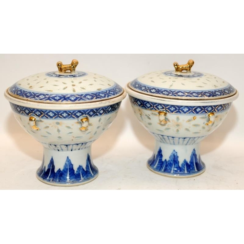 98 - A pair of Chinese 19th century Kangxi style rice grain tureens with inner bowls and finished with gi... 