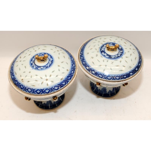 98 - A pair of Chinese 19th century Kangxi style rice grain tureens with inner bowls and finished with gi... 