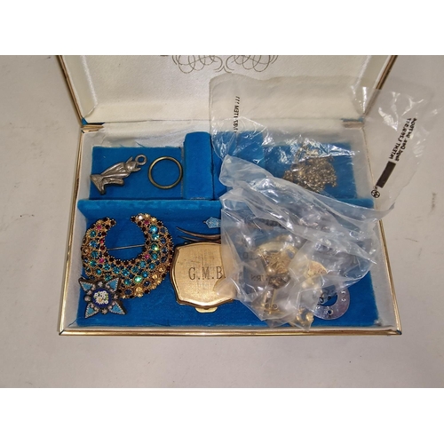 193 - Small blue jewellery box containing a collection of costume jewellery.
