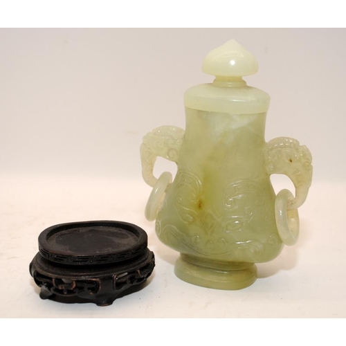 95 - A Chinese archaistic Jadeite vase & cover, twin elephant head handles and rings with original carved... 