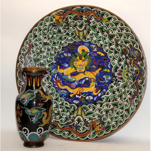 106 - A very large Chinese cloisonne enamel dragon charger (D60cm) and a similar vase H33cm.