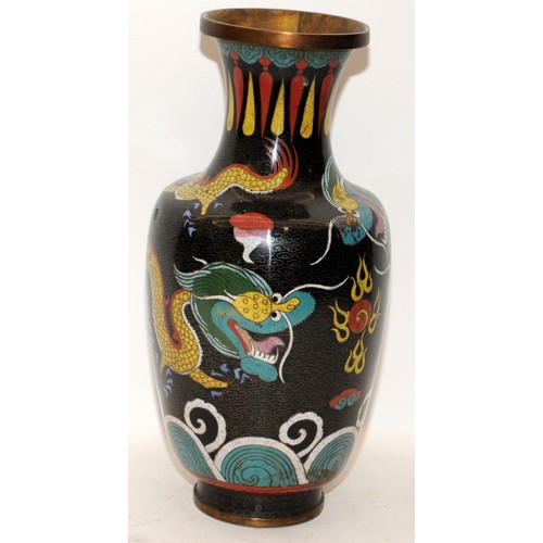 106 - A very large Chinese cloisonne enamel dragon charger (D60cm) and a similar vase H33cm.