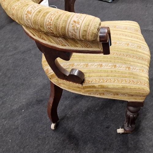 353 - Antique Victorian oak bedroom chair on porcelain castors.