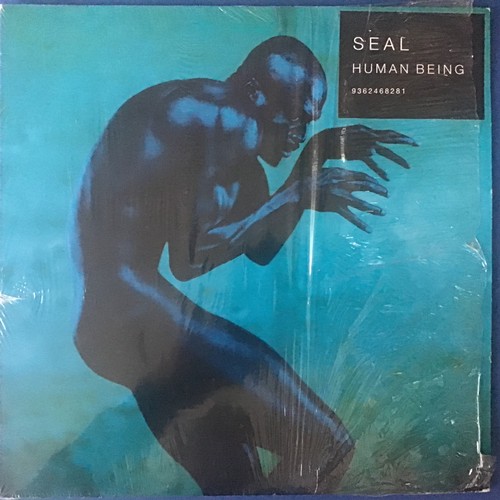 51 - SEAL “HUMAN BEING” VINYL LP RECORD. A Warner Brothers Record 1-46828 released in 1998 and is found h... 