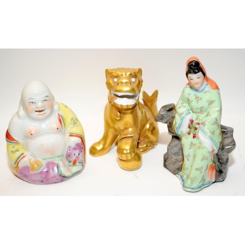 113 - A collection of nine Chinese ceramic figures to include tradesman, buddhas, gilt foo lion and hooded... 