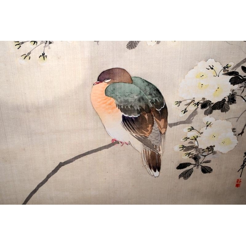 119 - Large Oriental scroll type picture of a bird on prunus branch, signed bottom right, framed and glaze... 