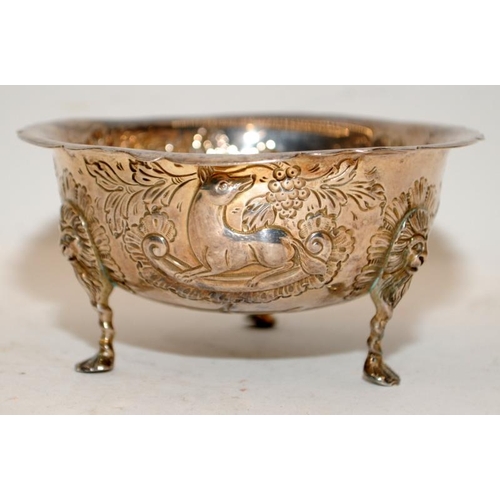 160 - Hallmarked silver bowl on three feet with repousse decoration featuring a hound and a deer. Hallmark... 