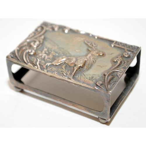 162 - Sterling silver tobacco tin hallmarked for Birmingham 1921, c/w a matchbox holder featuring a stag h... 