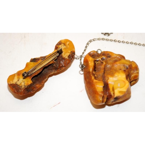 132 - A collection of Chinese amber to include bracelet, pendant, two wood cased items and an amber plaque... 