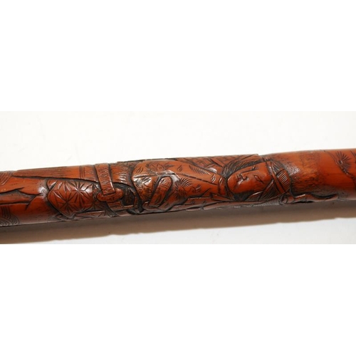 138 - Vintage Oriental bamboo walking stick extensively carved with warriors. 95cms.