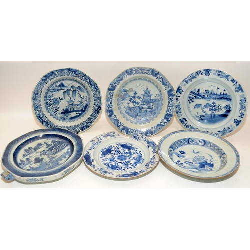 139 - A collection of Oriental blue & white china to include bowls, plates and a plate warmer. 6 items in ... 