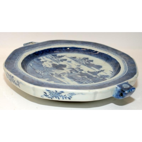 139 - A collection of Oriental blue & white china to include bowls, plates and a plate warmer. 6 items in ... 