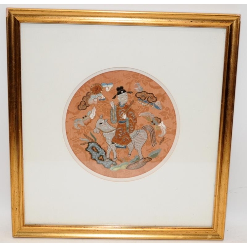 141 - Framed and glazed Chinese textile embroidery roundel of a scholar on a donkey. O/all frame size 30cm... 