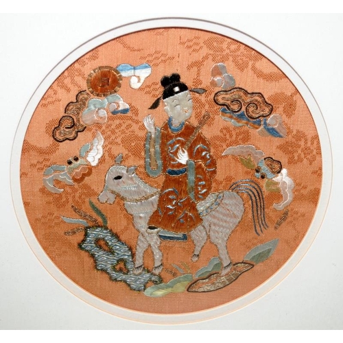 141 - Framed and glazed Chinese textile embroidery roundel of a scholar on a donkey. O/all frame size 30cm... 