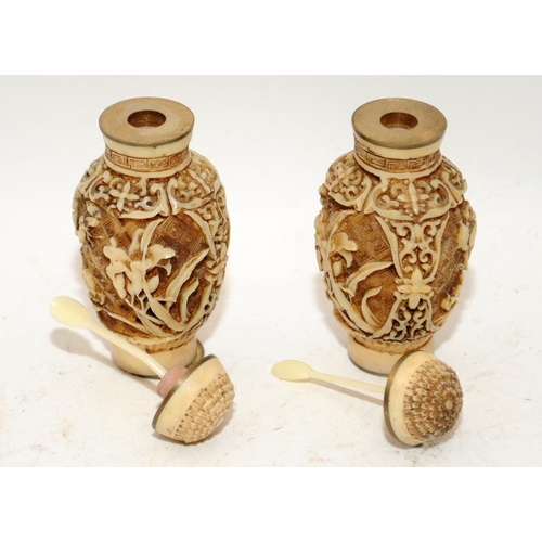 144 - Two Oriental carved scent bottles. 7cm tall