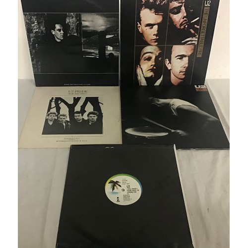 282 - COLLECTION OF 5 x U2 VINYL 12” SINGLES. Titles here are as follows - Pride - Desire - Still Haven’t ... 