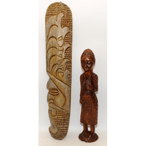 398 - Free standing hand carved wooden figure of a Jamacan woman c/w a carved wooden decorative board. Boa... 