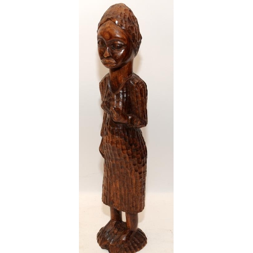 398 - Free standing hand carved wooden figure of a Jamacan woman c/w a carved wooden decorative board. Boa... 