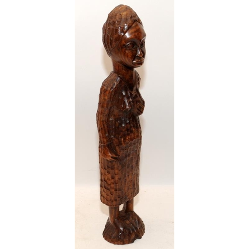 398 - Free standing hand carved wooden figure of a Jamacan woman c/w a carved wooden decorative board. Boa... 