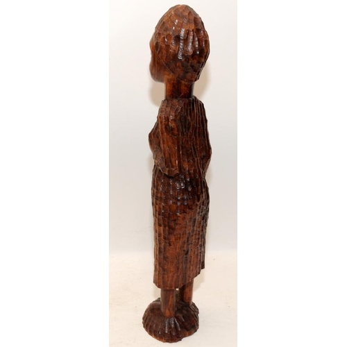 398 - Free standing hand carved wooden figure of a Jamacan woman c/w a carved wooden decorative board. Boa... 