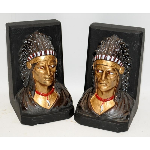 399 - Pair of bookends in the form of Native American busts. 16cms tall.