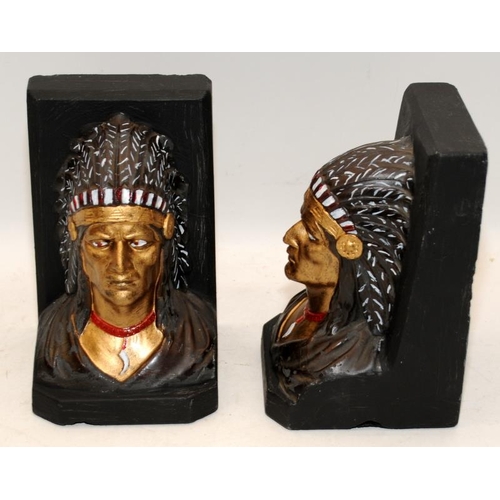 399 - Pair of bookends in the form of Native American busts. 16cms tall.