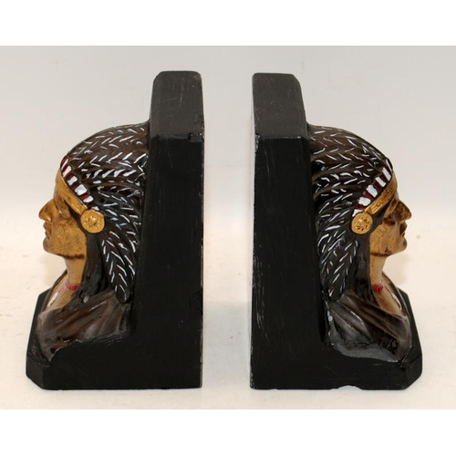 399 - Pair of bookends in the form of Native American busts. 16cms tall.