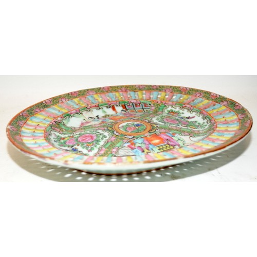 100A - Vintage Oriental Famille Rose oval plate with pierced border around painted scenes. 27cms across