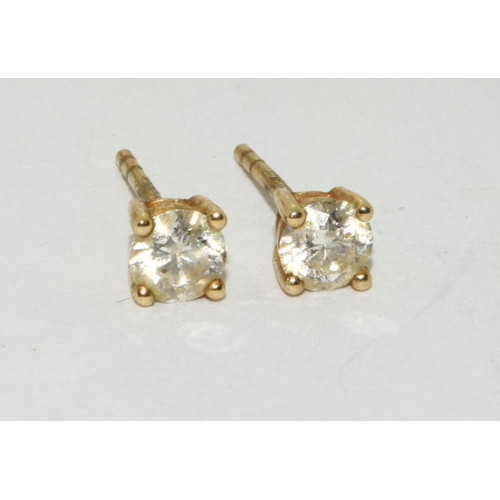 57 - Diamond stud gold earrings of approx 0.25ct each total approx 0.50ct