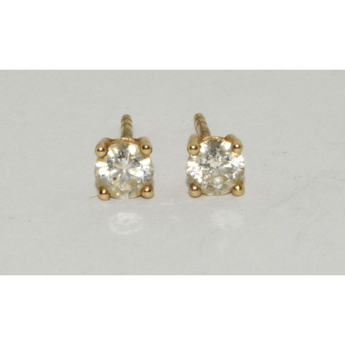 57 - Diamond stud gold earrings of approx 0.25ct each total approx 0.50ct