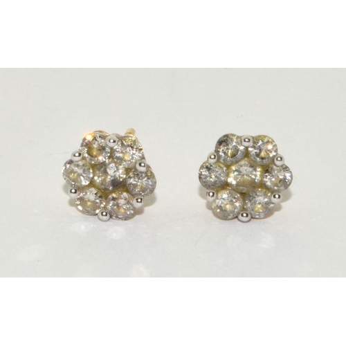 44 - 9ct gold Diamond earrings a cluster of 7 diamond each a total approx 0.50ct each with certificate to... 