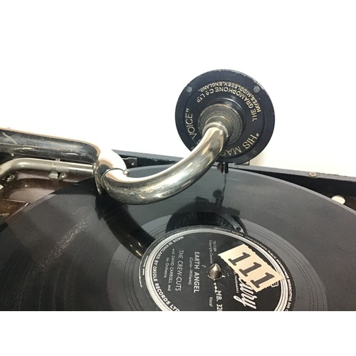450 - HMV WIND UP GRAMOPHONE. This works and plays a record and comes with spare needles in push out conta... 