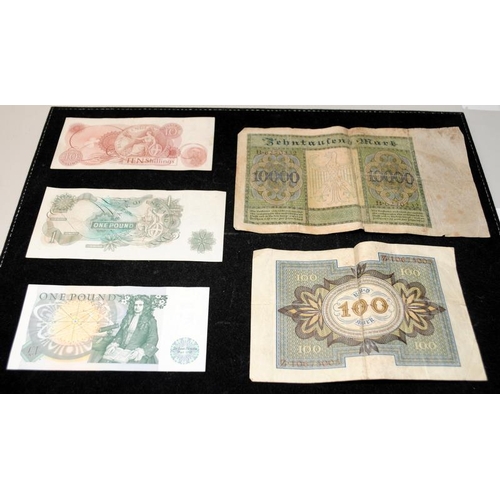 302 - A collection of banknotes to include 10/-, £1 notes and two German notes