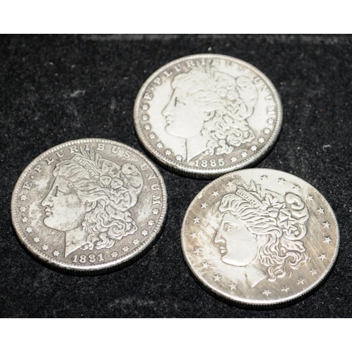 305 - 2 x Morgan Dollars, 1881 and 1885, both with New Orleans mint mark. Also included is a similar size ... 