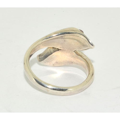 390 - A sterling silver lily ring Size M , marked STG