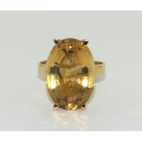 308 - 18ct gold large  Oval Topaz ring size Q