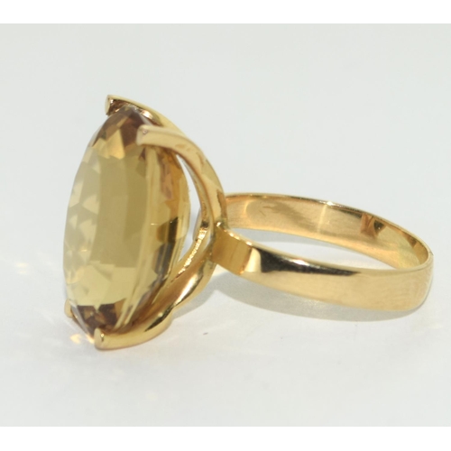 308 - 18ct gold large  Oval Topaz ring size Q