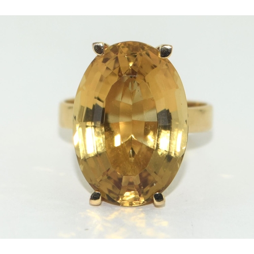 308 - 18ct gold large  Oval Topaz ring size Q