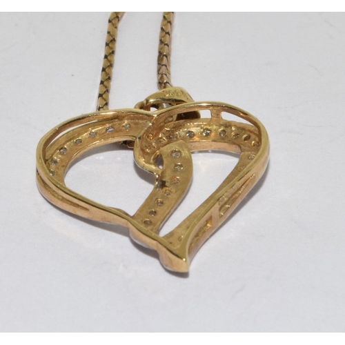 462 - 9ct gold Diamond heart pendant necklace 4.7g