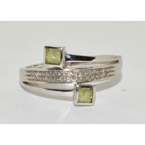 286 - 9ct white gold Diamond and Peridot designer sweep ring  size M