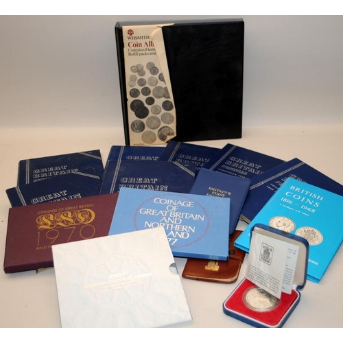 351 - A collection of GB coin collectors albums, part filled c/w with other coin related items and a silve... 